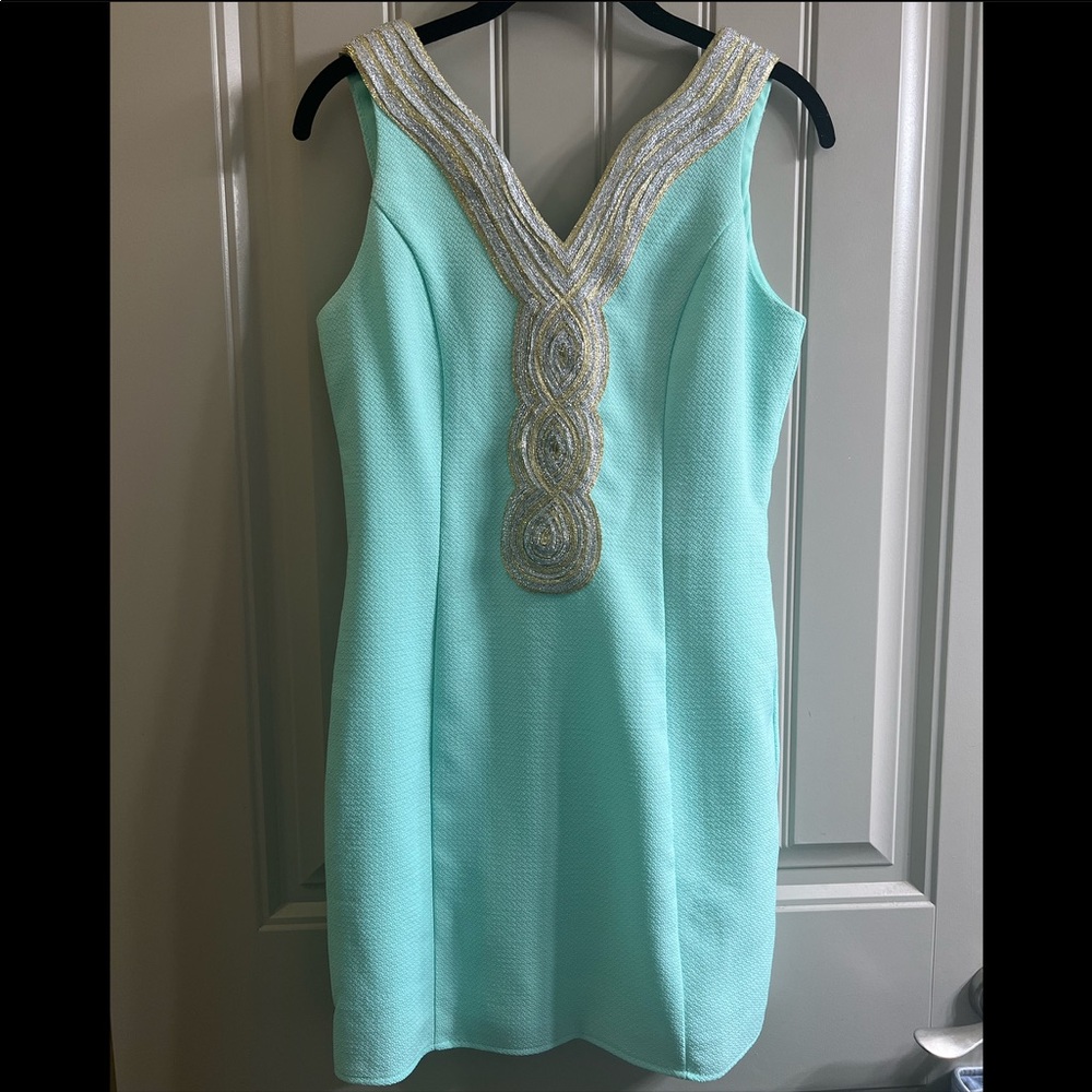 Pink Lily turquoise dress with gold and silver details
